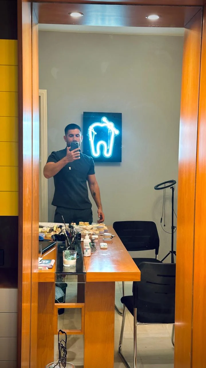 Dr. Abed Khabbaz in scrubs at his clinic