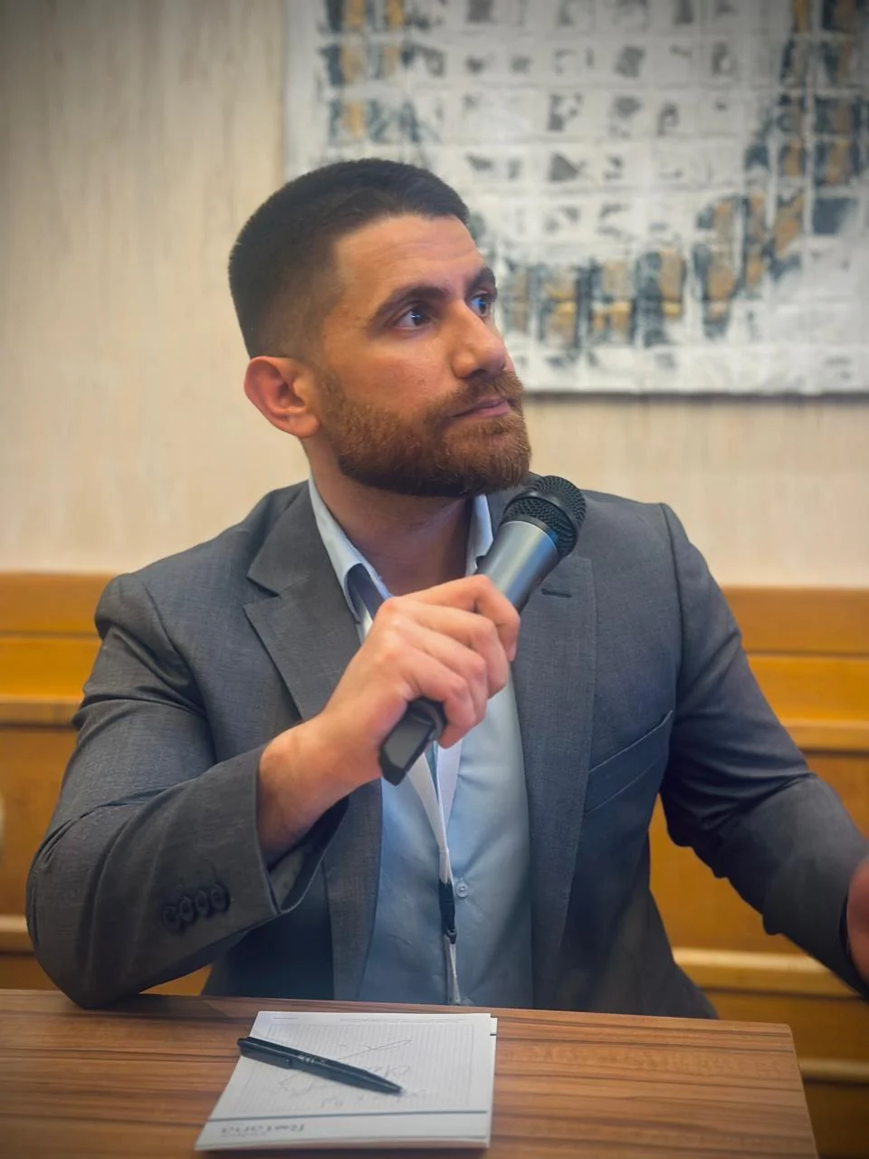 Dr. Abed Khabbaz participating in a medical conference discussion